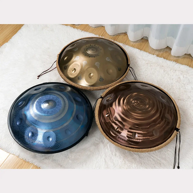 Three handpans in unique patterns made by handpanuni