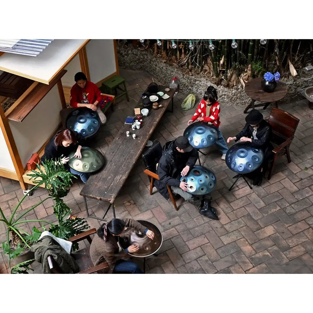 People playing handpans at Handpanuni's workshop